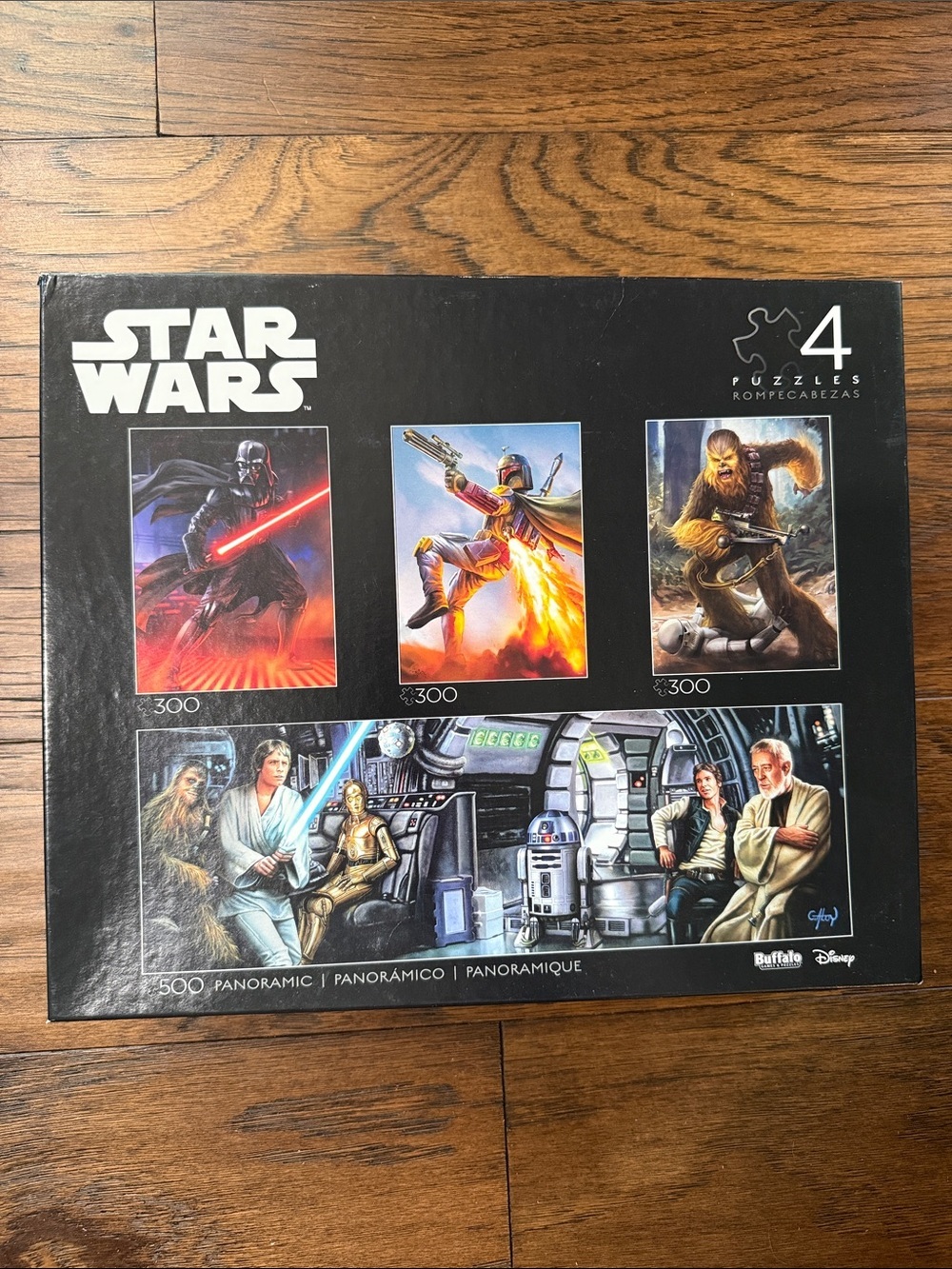 Star Wars Puzzle Set of 4 puzzles- in Black box with Red, Blue, Brown.